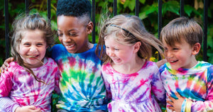 kids laughing together in worthy threads tie dye