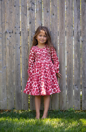 Girls long sleeved ruched dress in tomato print on toddler