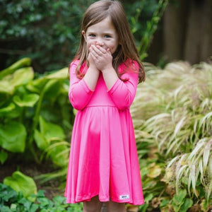 Toddler in hot pink twirly dress