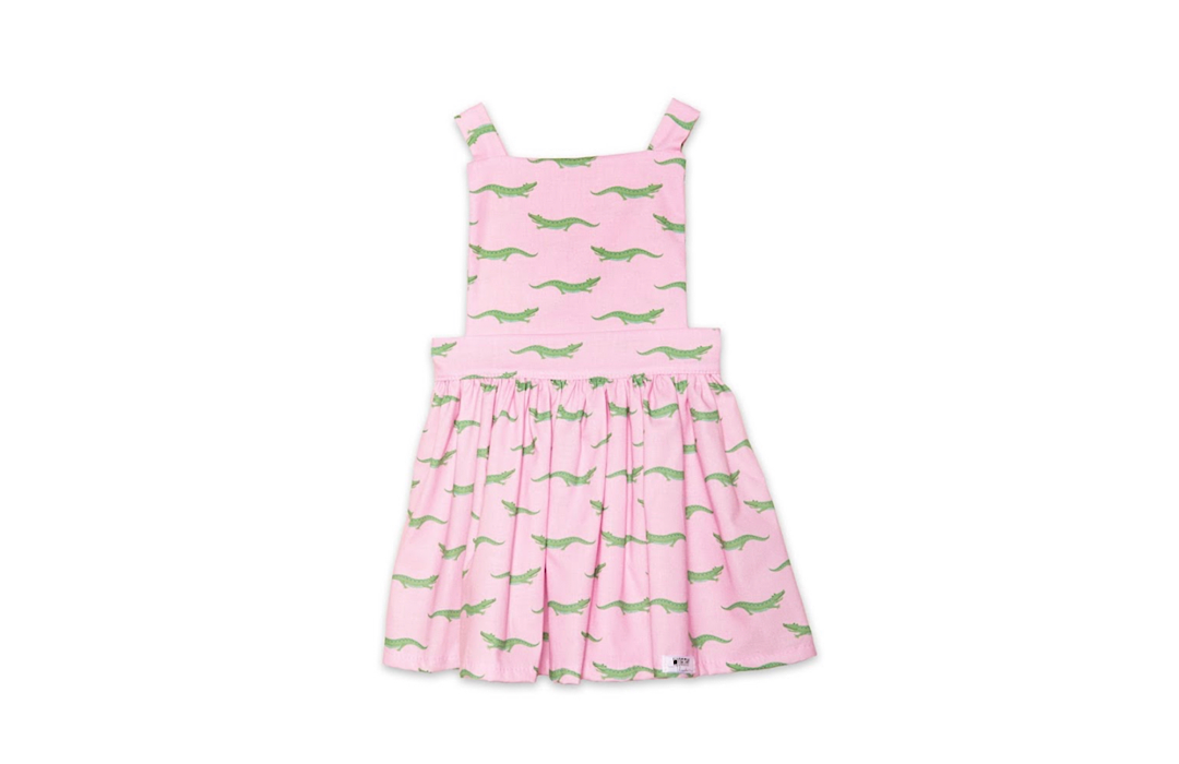 Girls pinafore dress in pink crocodile print