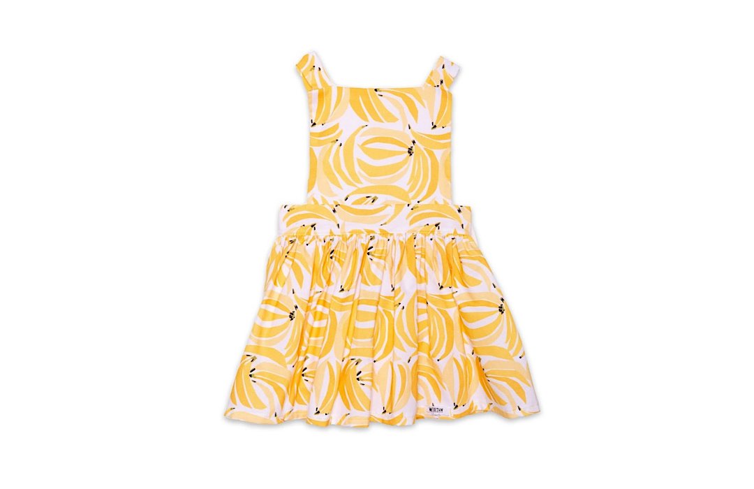 Girls pinafore dress in yellow bananas print