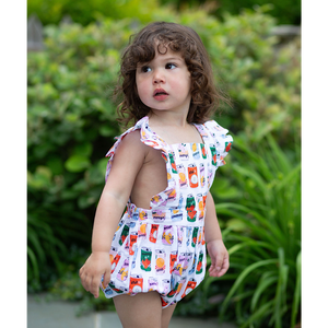 Toddler in ruffle sleeve baby bubble romper in retro soda can print