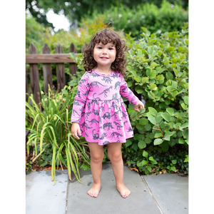 Baby and toddler long sleeve bubble romper in hot pink with dinosaur print