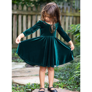 Christmas twirly dress in green velvet with embroidery