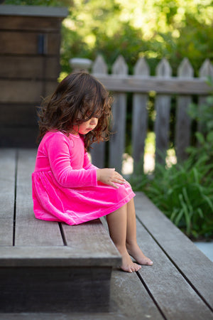 Toddler in baby bubble romper hot pink velvet with skirt