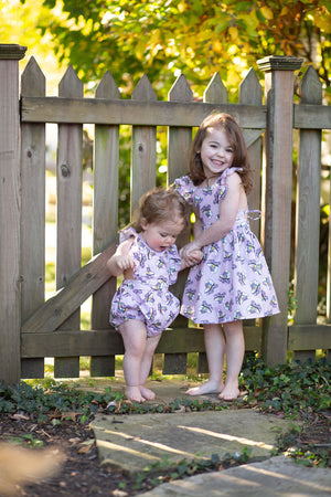 Matching sister outfits in retro roller skates print