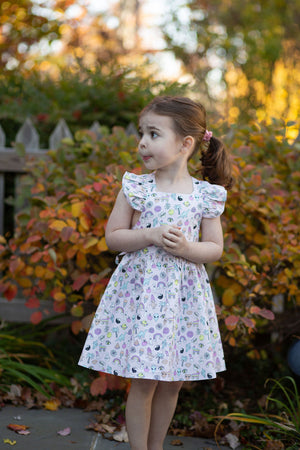 Toddler in ruffle sleeve dress- pink with retro toys print