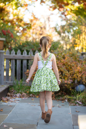 Girls pinafore dress in pickles print, back view