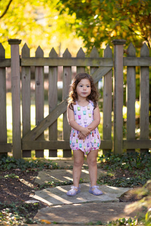 Toddler in cross back bubble romper