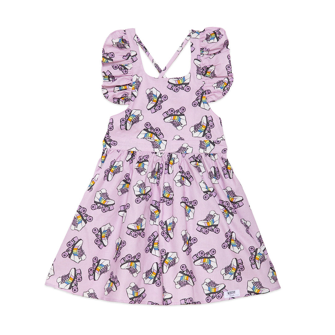 Girls ruffle sleeve dress featuring purple roller skate print