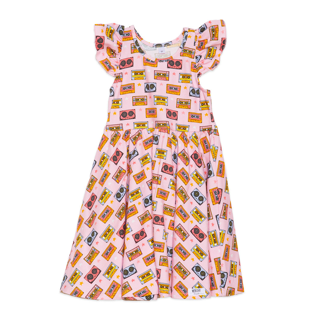 Girls twirly dress with racer back and ruffle sleeves, pink retro print