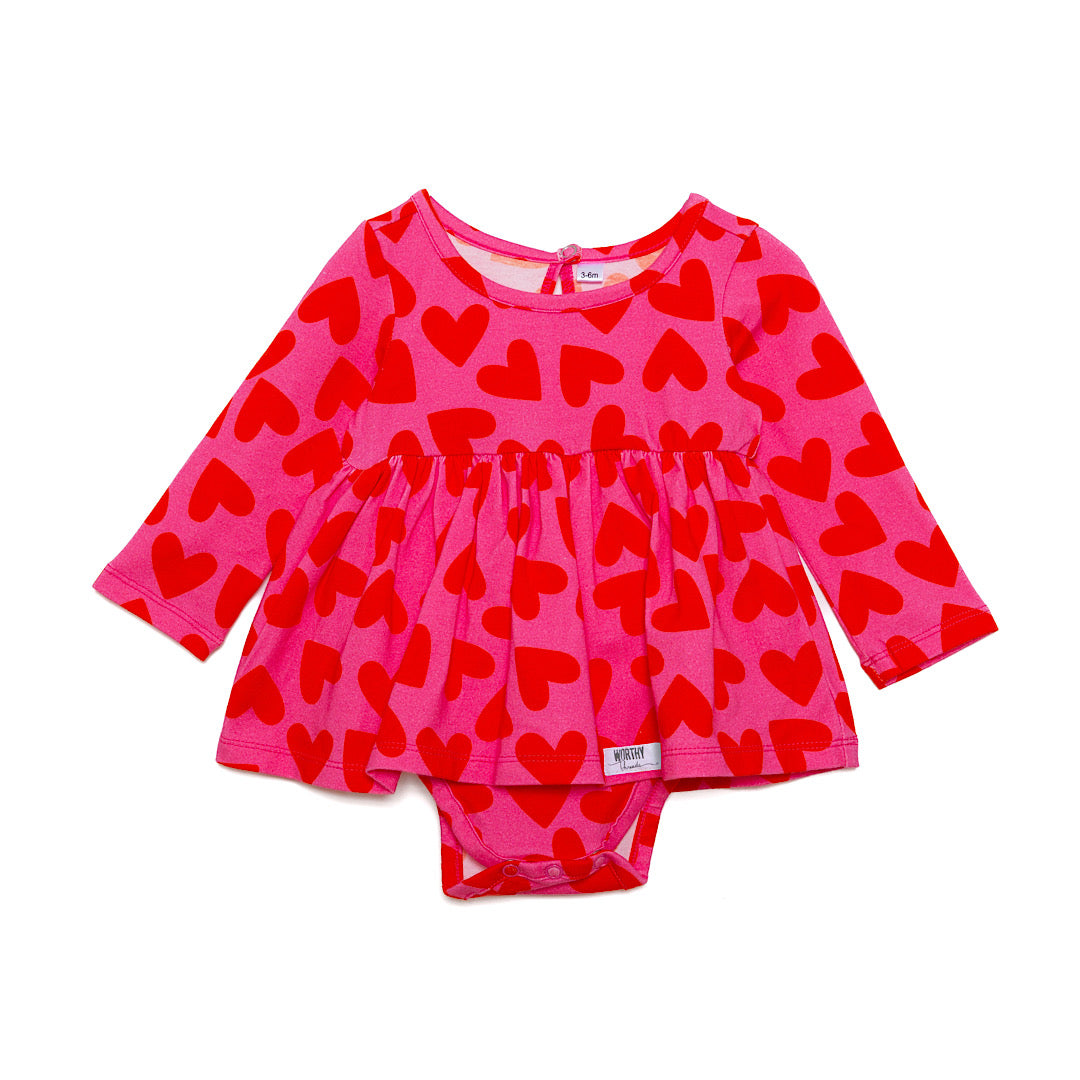 Baby bubble romper in pink hearts print for Valentine’s Day