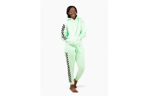Model in matching hand dyed green checkerboard loungewear set 