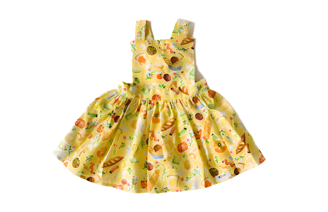 Baby pinafore dress in Carbo Load.  Unique baby and toddler clothing