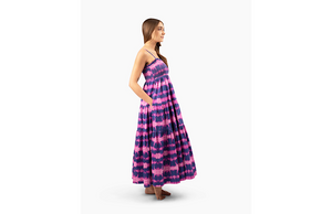 Model wearing Worthy Threads adult dress in fuchsia and navy tie dye