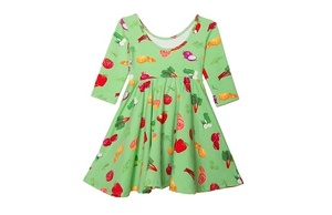 Girls twirly dress in green fruit and veggie print, back view.