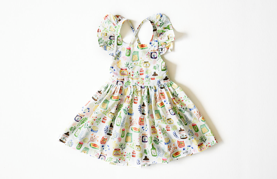 Ruffle sleeve girls boutique dress in gourmet food print.  Unique kids clothing