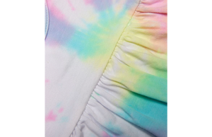 Close up of pastel tie dye bubble romper