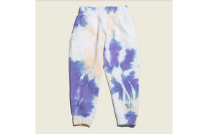 Kids tie dye joggers in purple and ivory.  Matching loungewear sets by Worthy Threads clothing brand.