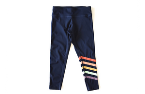 Kids navy leggings with rainbow stripes on leg