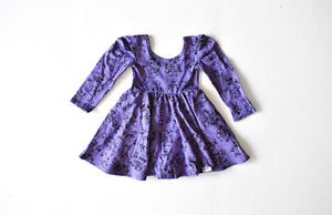 Twirly dress featuring Robots in purple.  STEM clothing for girls!