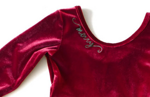 Close up on Christmas embroidery on girls burgundy twirly dress