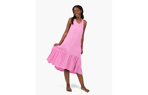 Model in pink racer back tank dress with pockets