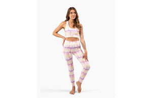 Girl modeling pastel tie dye activewear set: matching leggings and sports bra