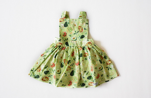 Girls pinafore dress in Avocado Toast.  Unique kids clothing by Worthy Threads clothing brand