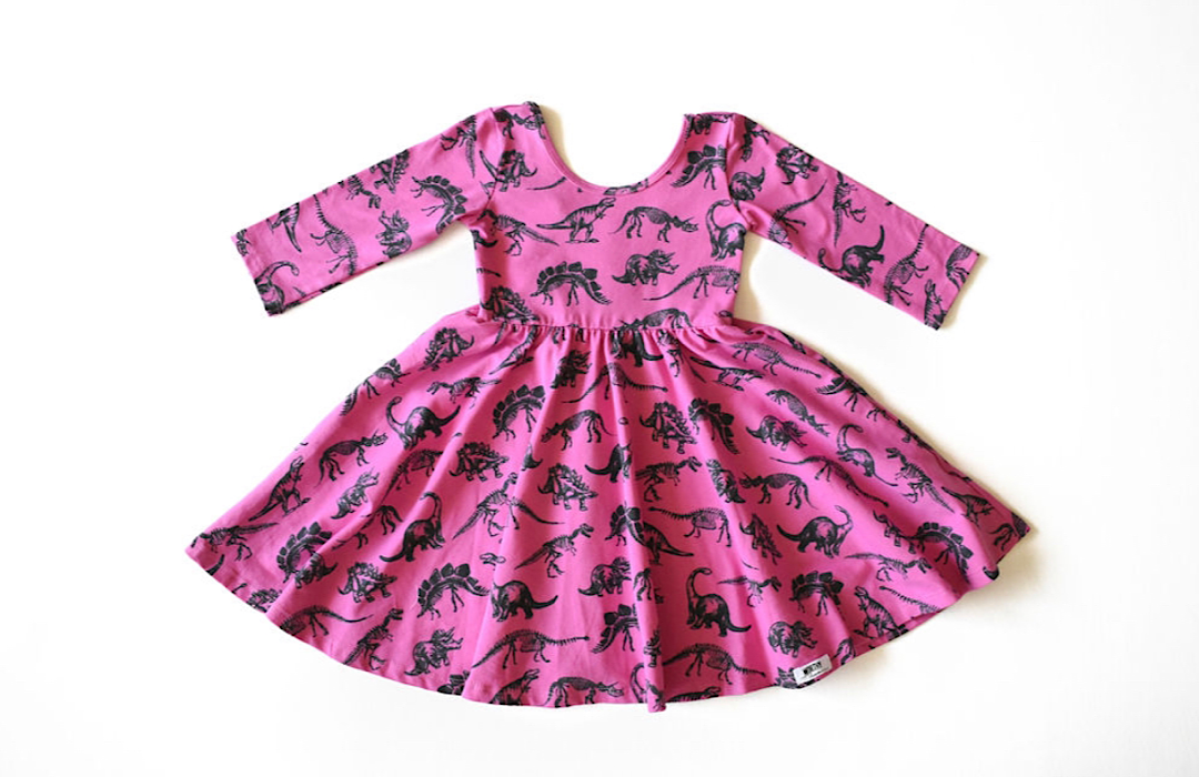 Girls twirly dress in hot pink dinosaur print: STEM clothing for girls
