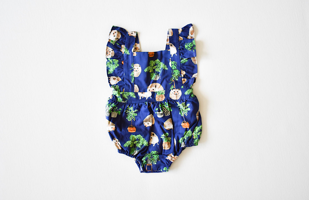 Baby bubble romper in hedgehog print.  Unique baby clothes by Worthy Threads clothing brand