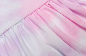 Close up of spun sugar tie dyed twirly dress